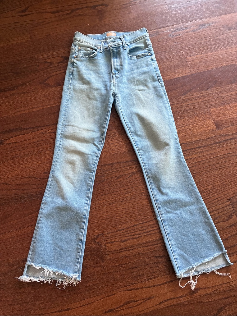 MOTHER Light Blue Flare Jeans with Frayed Hem